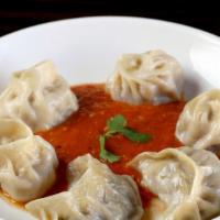 Momo · Most popular. Eight pieces. Steamed vegetables, all-natural ground chicken or beef dumplings...