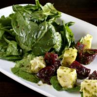 Beet Salad · Baby spinach, roasted beets, mozzarella and parsley vinaigrette.