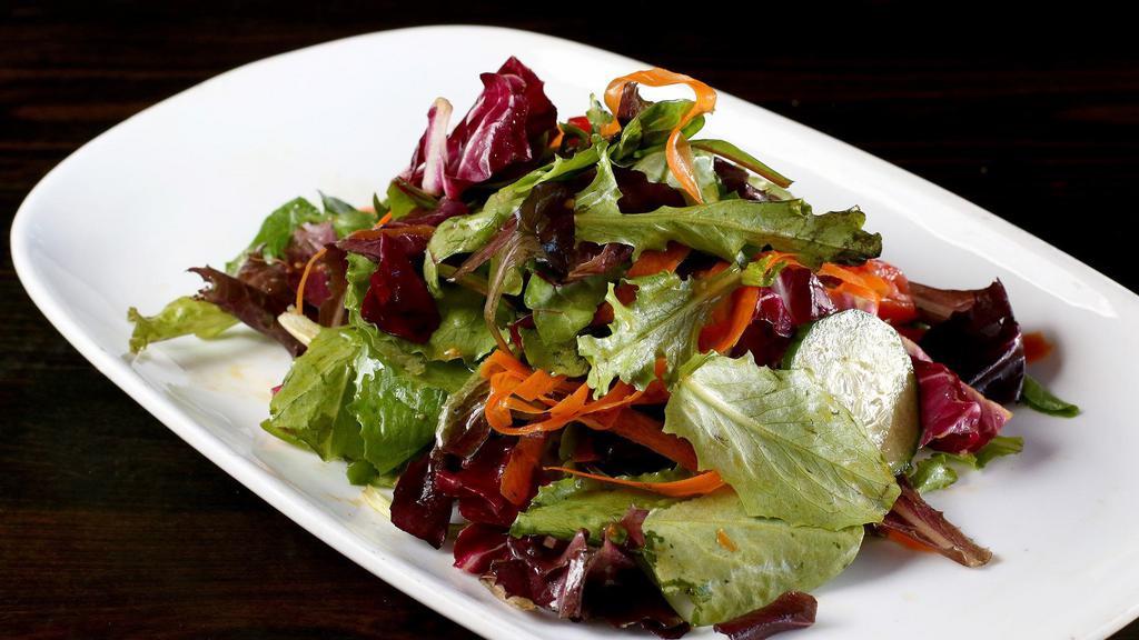 Mix Greens · Fresh spring mix, cucumber, carrots, cherry tomatoes with homemade soy-sesame dressing.