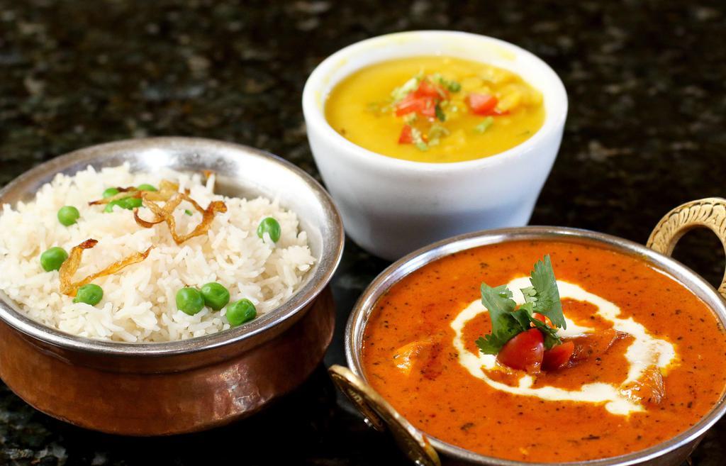 Tikka Masala · Tandoored cubes cooked in house delicacy creamy sauce.