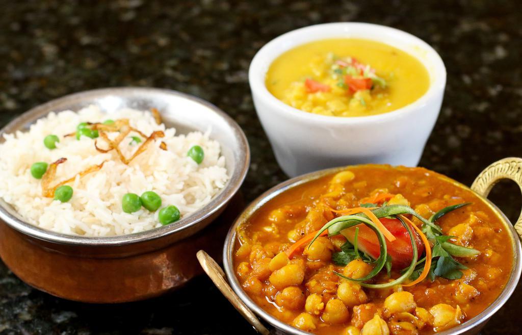 Vegan. Chana Masala · Vegan. Chickpeas cooked with special herbs and spices in taste of Himalayas gravy.