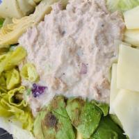 Classic Tuna Green Salad · Chicken breast over a bed of fresh lettuce, garnished with pepperoncini, avocado, artichoke,...