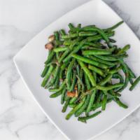String Beans Western Style · House special. String beans dry-sauteed with garlic and garnished with green onions; a house...