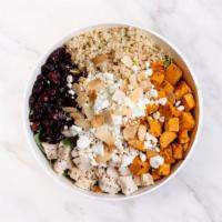 The Friendly Goat Salad · Arugula, roasted sweet potatoes, goat cheese, roasted sliced almonds, dried cranberries, bal...