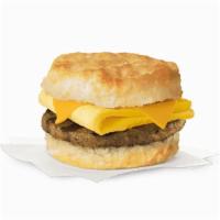 Sausage, Egg & Cheese Biscuit · A tasty pork sausage patty along with a folded egg and cheese served on a freshly baked butt...