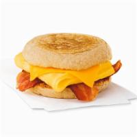 Bacon, Egg & Cheese Muffin · Delicious strips of smoked applewood bacon, folded egg and American cheese served on a toast...