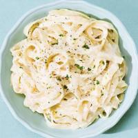 Fettuccine Alfredo · Fettuccine in rich and creamy Alfredo sauce topped with fresh Parmesan cheese.