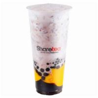 Husky · Fresh Milk Blended with Red Bean, also topped with mini pearl, big pearl, herb jelly and pud...