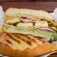 Ham and Zucchini Sandwich · Ham, grilled marinated zucchini, melted cheddar cheese and house-made pesto aoli.