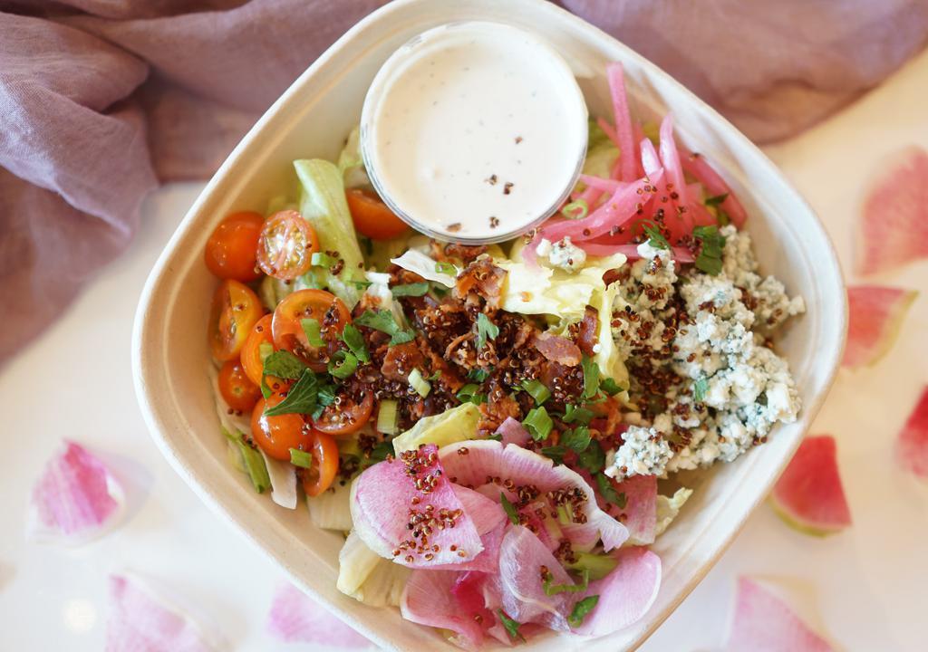 Berg and Blue · Iceberg lettuce, Blue cheese, bacon, quinoa crisps, pickled red onion, cherry tomato, watermelon radish. 
Chef's Rec: Blue cheese dressing 
Chef's Rec: Add Halal Chicken for extra charge.