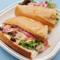 Wok-tossed Chicken Sandwich · Stir fry Chicken, Bell pepper mix, Spring mix, Sriracha aioli, Pickled red onions and cilant...