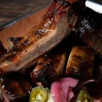 Quarter Rack Ribs · St Louis style pork ribs with our original BBQ sauce