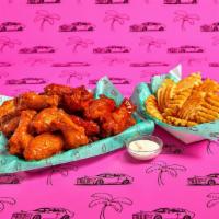Major Party Pack: 24 Pack · 24 Classic Bone-in or Boneless wings with choice of 2 flavors, regular fries and 2 dips.