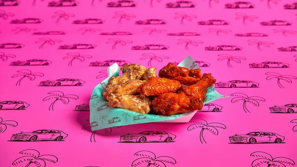 10 Wings · 10 Classic Bone-in or Boneless wings with choice of 1 flavor and 1 dip.