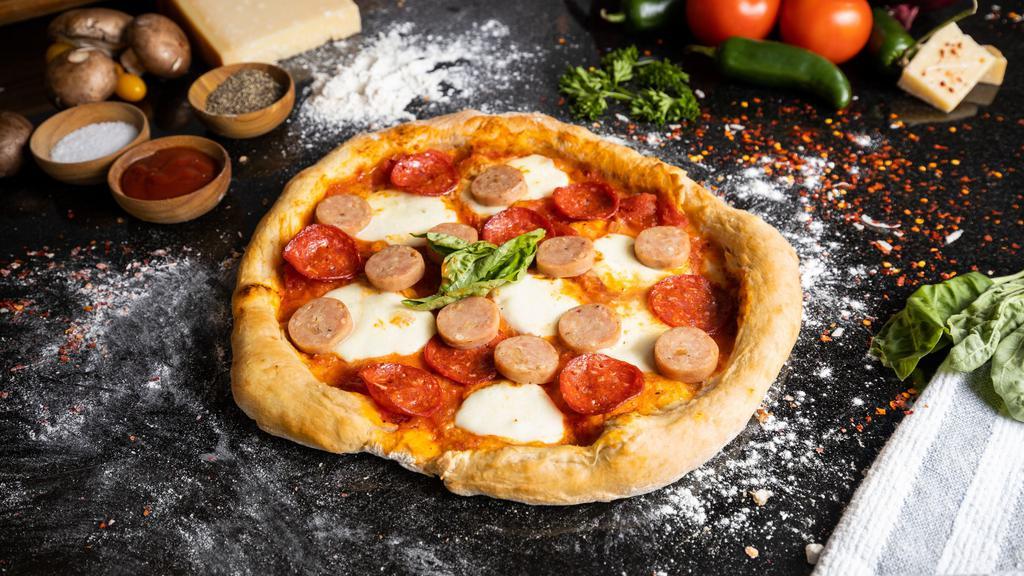 Mr Sausage-Pepperoni Pizza · Sausage, pepperoni, mozzarella baked on our homemade tomato sauce and pizza dough.