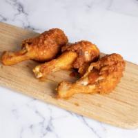 Drumsticks · Classic, juicy homemade drumsticks carefully seasoned and served with a sauce.