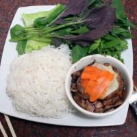 31. Bún Chả Hà Nội · Large. BBQ pork and pork patties with thin noodle.
