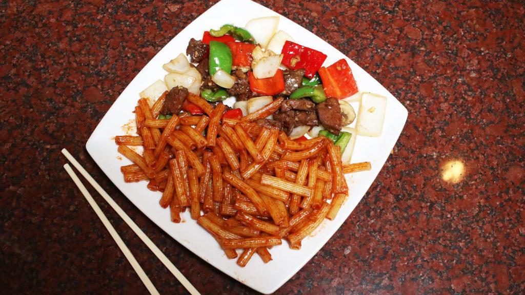 45C. Nui Xào Bò Lúc Lắc · Tomato pasta with filet mignon shaking beef.