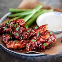 Boneless Wings · Crisp chicken breast tenders, served with celery and your choice of housemade blue cheese or...