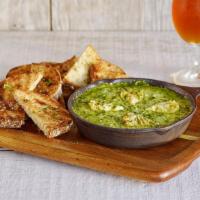 Baked Spinach & Artichoke Dip  · House-made spinach and artichoke dip topped with parmesan cheese & baked, served with corn t...
