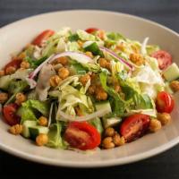 House Salad · Mixed greens, grape tomatoes, shredded carrots, cucumbers, and red onions, tossed in our hou...