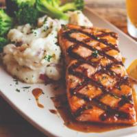 IPA Salman · Grilled Atlantic Salmon, brushed with our sweet IPA glaze served with fries  & steam broccoli