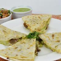 Quesadilla Cielito · A flour tortilla is filled with melted cheese and your choice of meat.