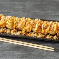 Rock & Roll · Deep-fried roll with unagi, cream cheese, and cucumber, topped with tempura flakes, spicy ma...