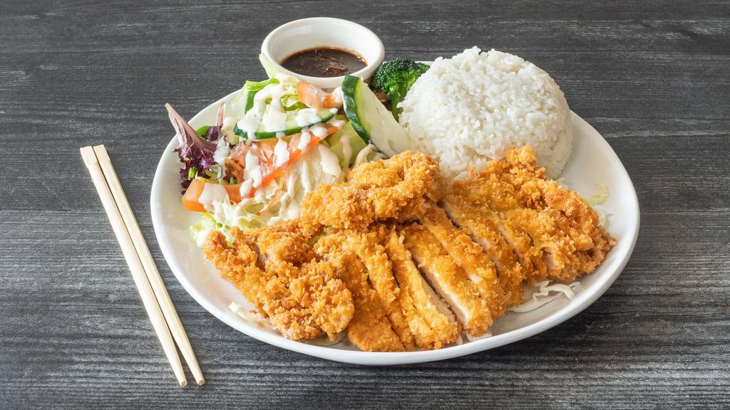Chicken Katsu · Deep-fried chicken cutlet served with katsu sauce.