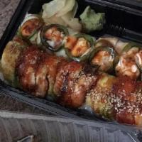 3. Dragon · Roll with shrimp tempura, mixed crab meat, cucumber, unagi, avocado, tobiko and unagi sauce.