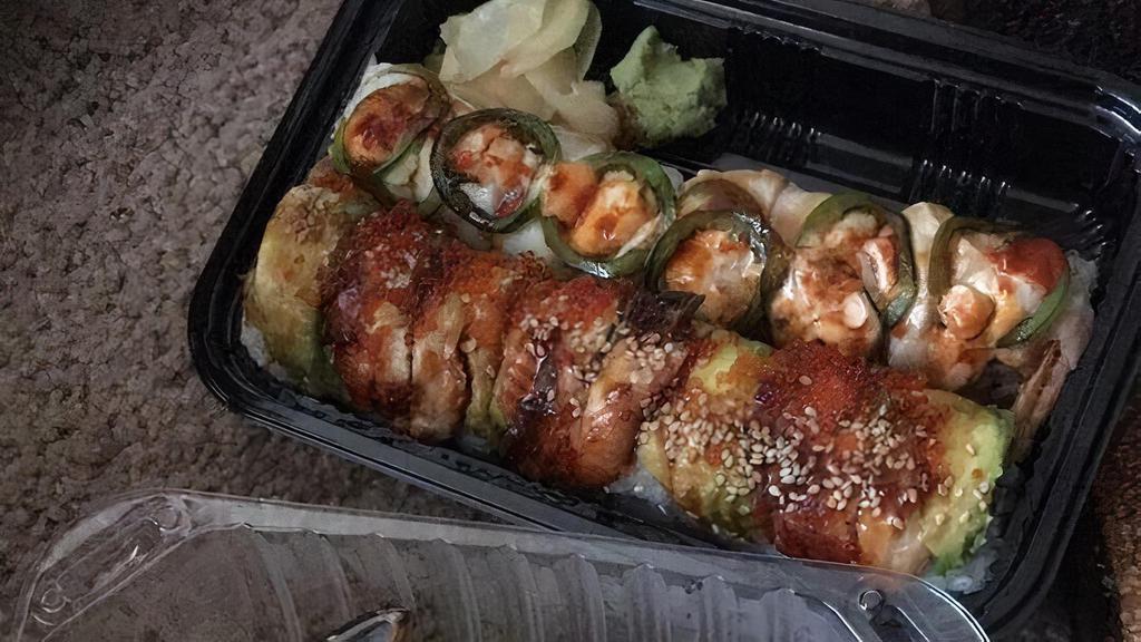 3. Dragon · Roll with shrimp tempura, mixed crab meat, cucumber, unagi, avocado, tobiko and unagi sauce.