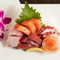 Sashimi Combo  (12pcs) · Two slices of salmon, salmon belly, hamachi, hamachi belly, blue fin tuna, blue fin tuna bel...