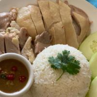 Khao Mun Gai · Poached chicken with rice and homemade sauce.