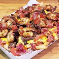 Beef N Shrimp Cheese Fries · Pan Fried Beef and Shrimp, Onions, House Sauces, Nacho Cheese, Diced Tomatoes o/ Bed of Cris...