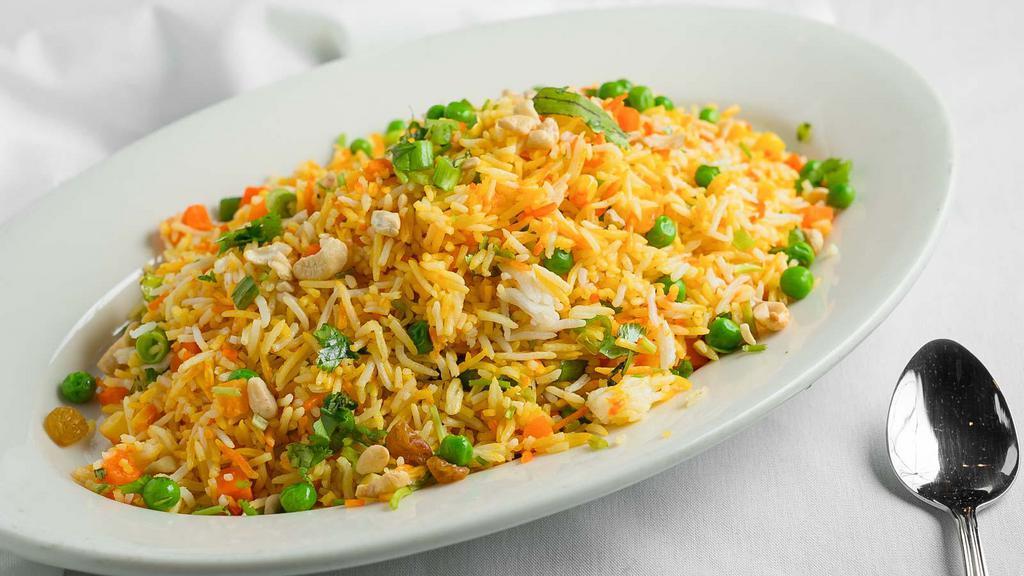 Veg. Biryani · Vegetarian, gluten free. Tender pieces of homemade cheese and bell peppers cooked with basmati rice.