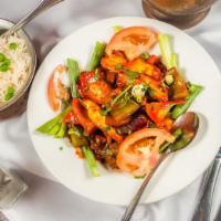 #33. Chicken Chilly · Pan-fried marinated chicken strips with bell pepper and onion, cooked with Himalayan sauce.