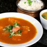 Fish Vindaloo · Salmon fish fillets cooked with tomato, onion based specially prepared vindaloo sauce and he...