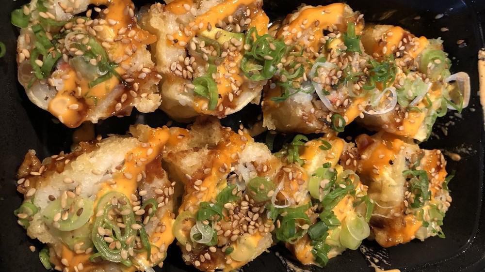 Crispy Californian Roll · Eight pieces.Deep fried,avocado, crabmeat, top with, green onion, sesame seeds and unagi sauce, spicy mayo.