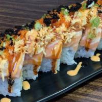 Wow Roll · Eight pieces.Shrimp tempura, cucumber top with salmon, spicy crab, spicy mayo, unagi sauce, ...