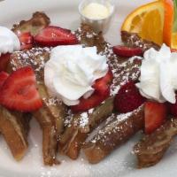 Texas Style French Toast · Three slices of Texas style thick-cut french toast.