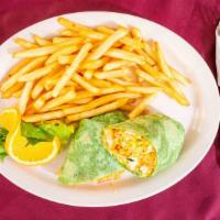 Buffalo Crispy Chicken Wrap · Lettuce, tomato, cheddar cheese, chicken strips, buffalo ranch dressing on spinach tortilla.