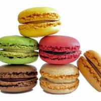 French Macarons · Enjoy these delicate sandwich cookies that feature  a crispy outer shell and creamy inner fi...