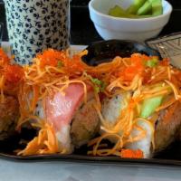 Titanic Roll · Shrimp tempura wrapped with salmon and tuna topped spicy crab meat, avocado and green onion,...