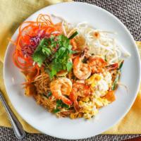 Pad Thai · Stir-fried small rice noodles , dried shrimps, tofu, egg, crushed peanuts, chives, and bean ...