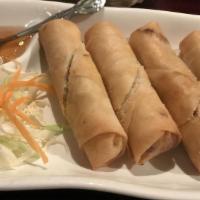 Thai Egg Rolls (4 pieces) · Deep fried egg rolls stuffed with silver noodles, black mushrooms, carrots, and shredded cab...