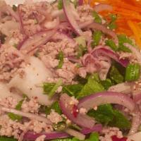 Larb Salad · Choice of protein with cilantro, mint leaves, red onion, and crushed roasted rice powder in ...