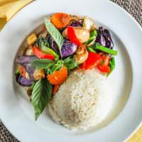 Pad Ma-Kuer · Sautéed eggplant with bell peppers, sweet basils in Thai chili spicy garlic sauce. Served wi...