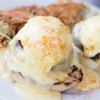 Crab Cake Benedict · Served on English muffin, poached eggs with hollandaise sauce and hash browns.