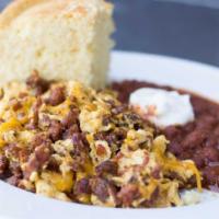 Santa Fe Scramble · Scrambled with cheddar cheese. Served with red bean chili, sour cream and corn bread.