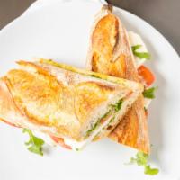 Mozzarella Sandwich · Mozzarella, tomatoes, olive oil, pesto and aioli.